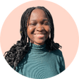 Kemi smiles at camera