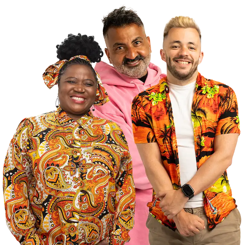 A group of three smiling people