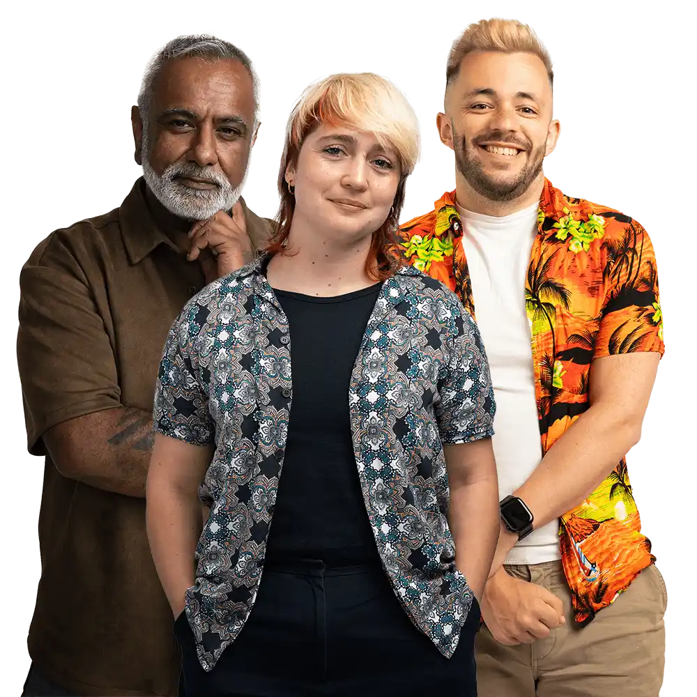 A group of three smiling people