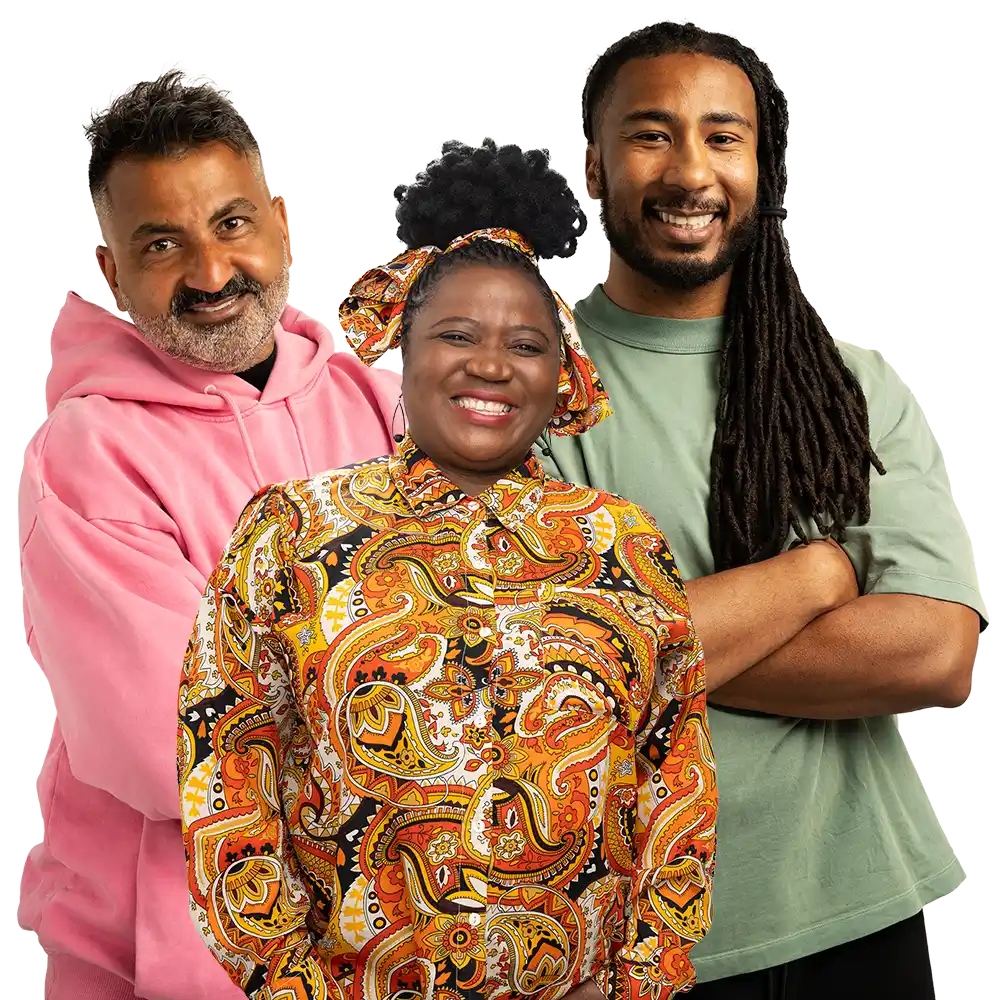 A group of three smiling people